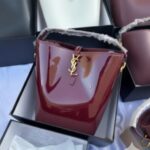 شنطة YSL Bucket Bag  - لون مارون لامع (Burgundy Patent) لإطلالة فخمة لا تُنسى