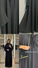 ⁦عباية راقية تتميز بشريط تطريز  خرز رفيع ممتد على طول العباية من الأمام وعلى أطراف الأكمام ليعطي لمسة من الفخامة الهادئة.⁩ - الصورة ⁦2⁩