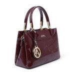 ⁦حقيبة يد لورينا (LORAINA) العصرية - فخامة النقوش واللمسات الذهبية⁩ - الصورة ⁦7⁩